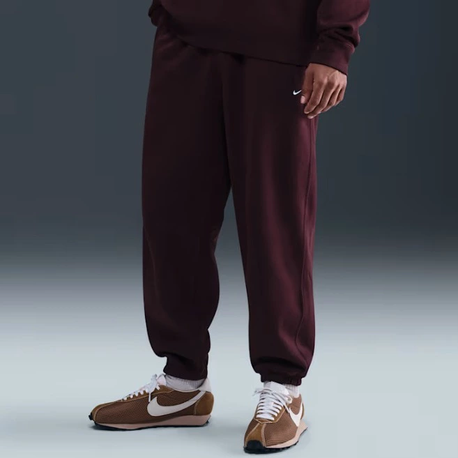 Nike Solo Swoosh Pantalón de tejido Fleece con bajos elásticos - Hombre