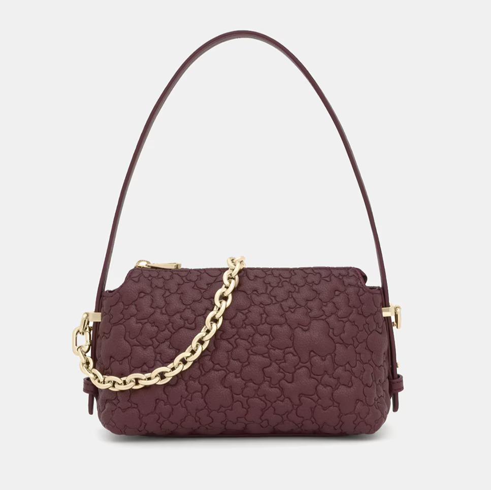 Tous
Bolso mini con cierre de cremallera y doble asa.