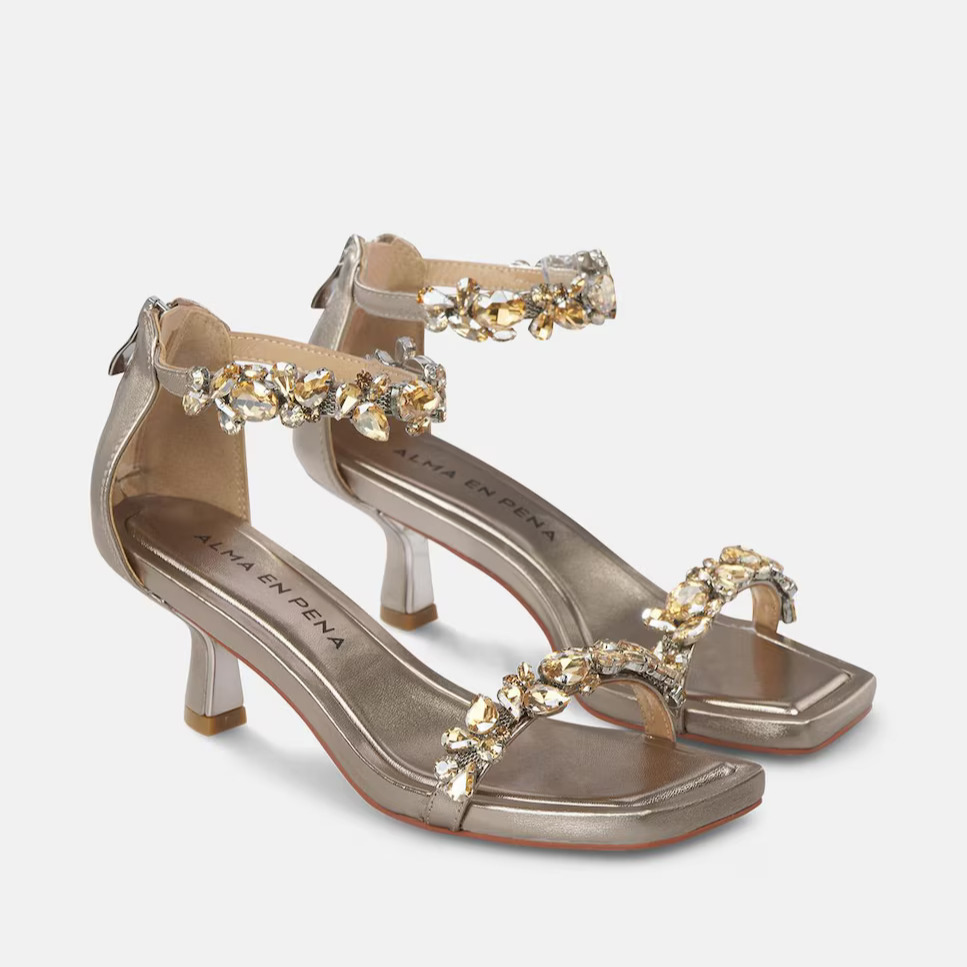 Alma en Pena
Sandalias de tacón de mujer con tiras de pedrería y cierre con hebilla
