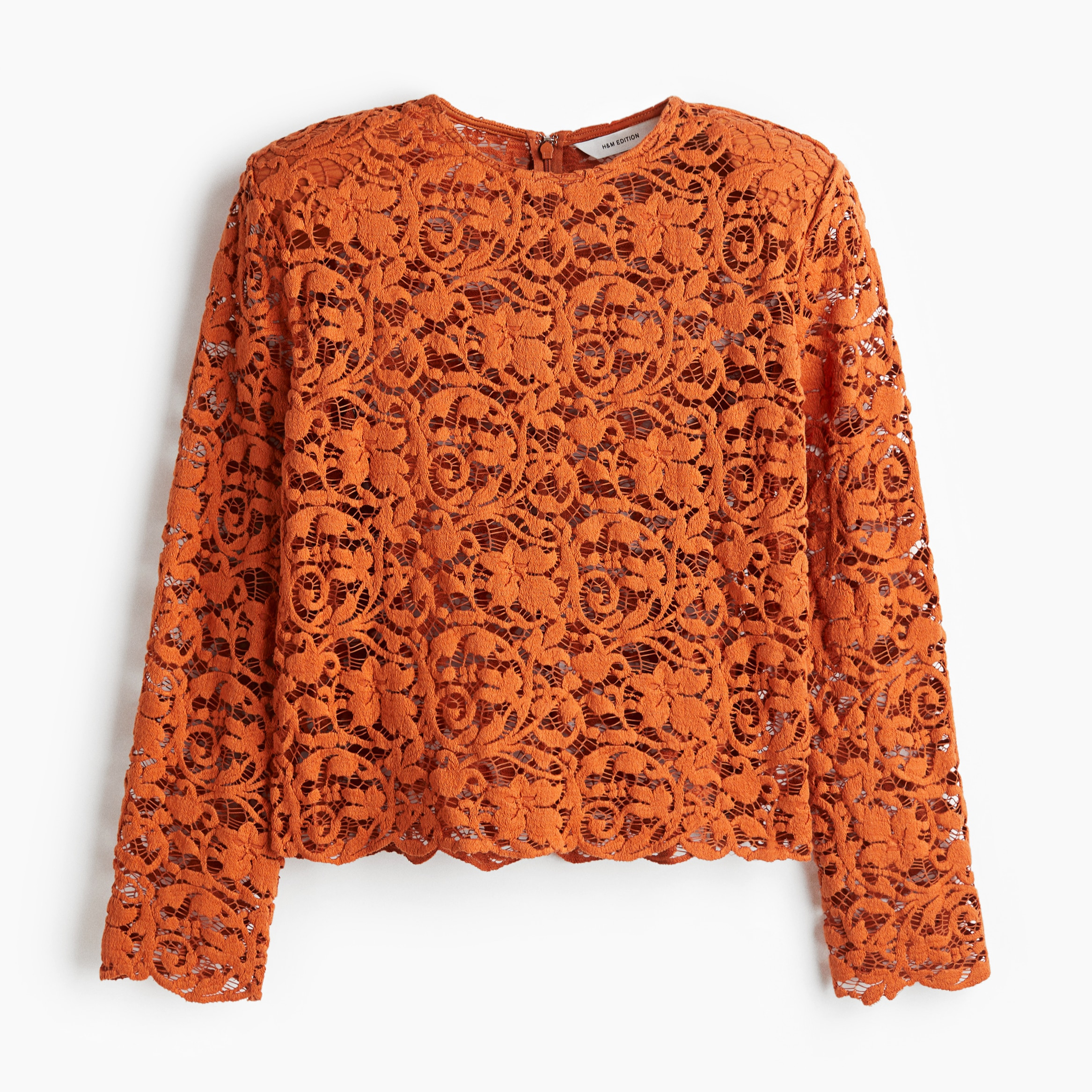 Blusa de encaje con hombreras