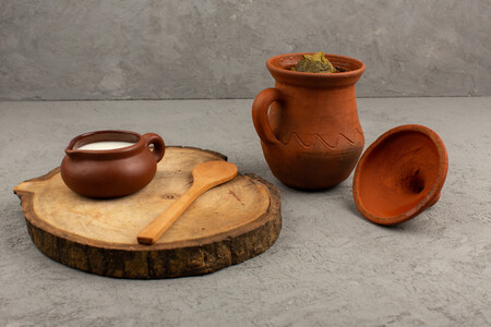 Front View Brown Pots Designed With Dolma Yogurt Grey Floor