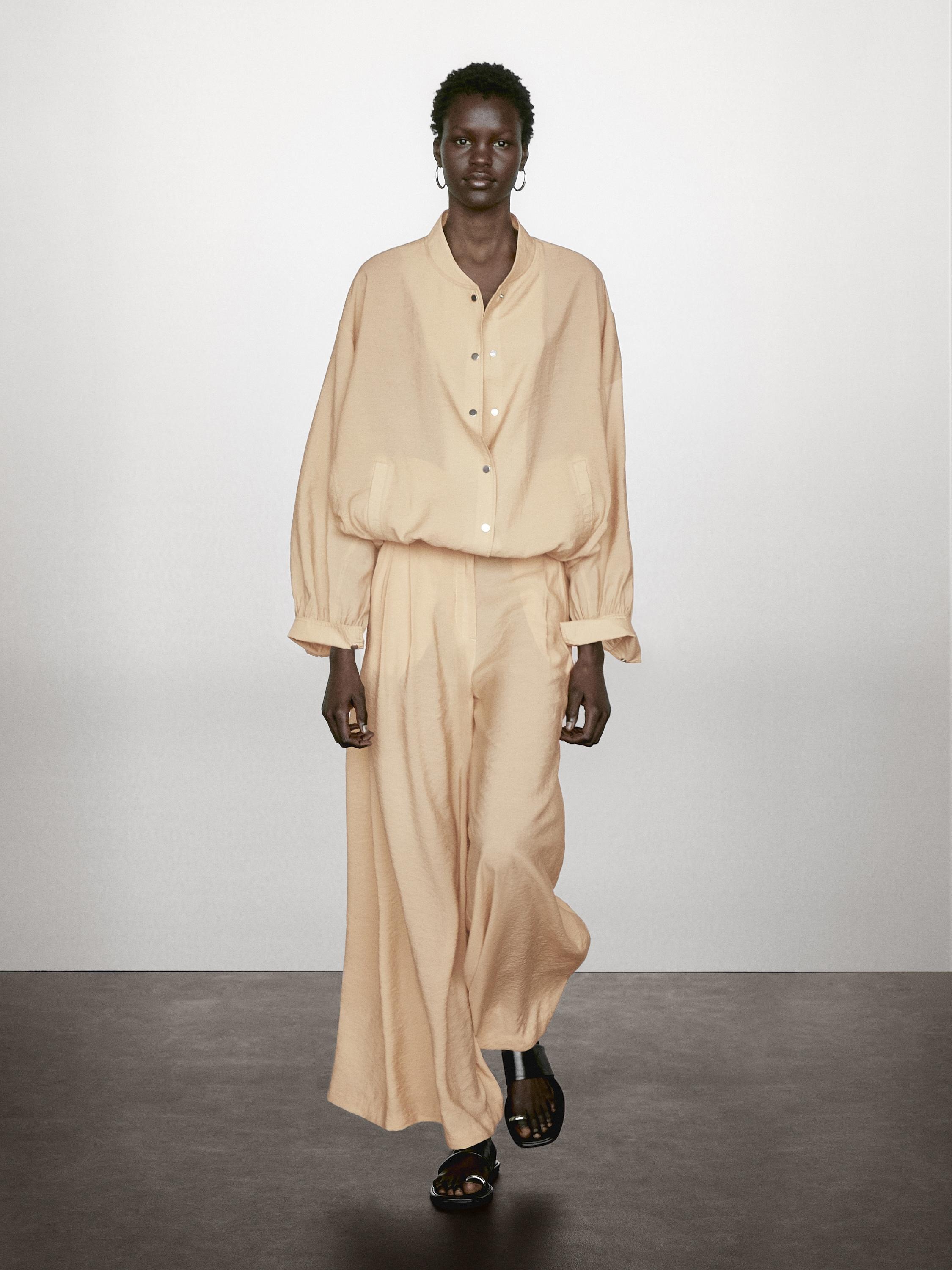 Pantalón palazzo beige 