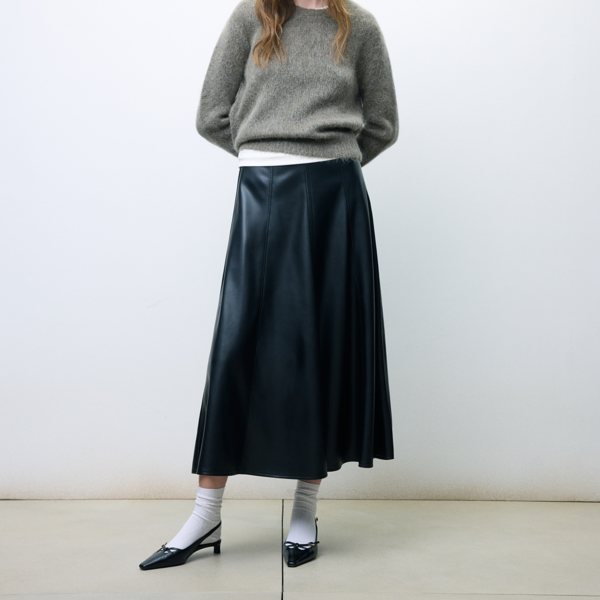 Tintoretto - Falda midi efecto piel.