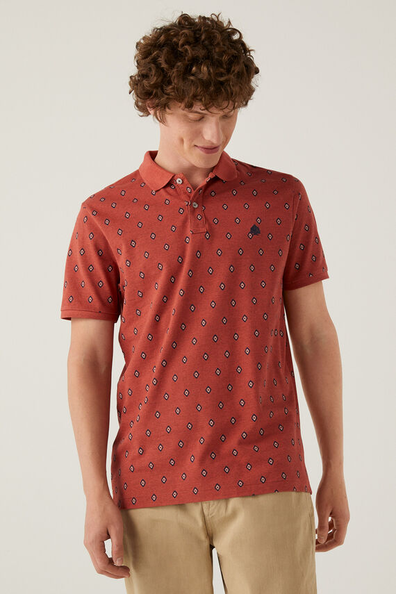 Polo naranja con estampado all over