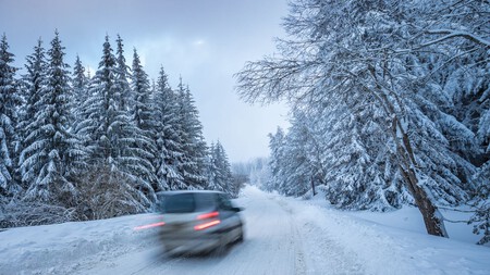 Car Driving In Remote Snow Covered Landscape Royalty Free Image 1613169914