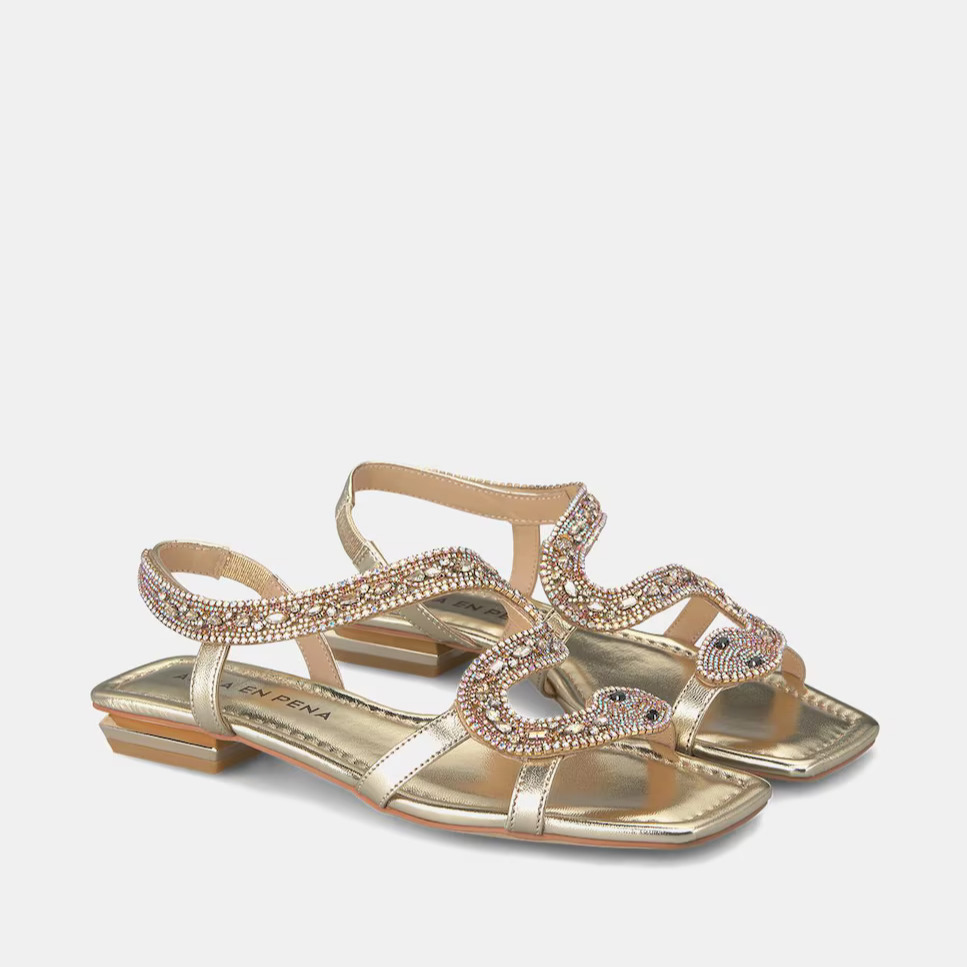 Alma en Pena
Sandalias planas de mujer con puntera cuadrada y serpiente de pedrería