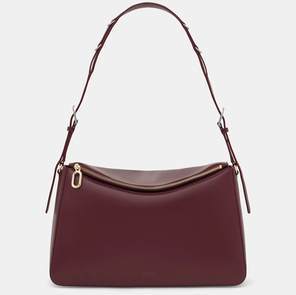 Bolso de hombro con cierre de cremallera y asa larga ajustable. Tous

