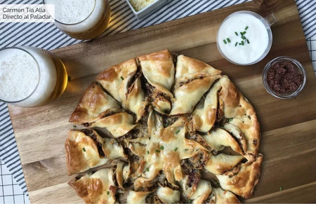 Estrella de pizza rellena de tapenade, champiñón y queso: receta fácil y lucida con vídeo incluido