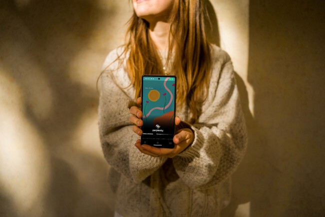 Mockuuups Woman Showing A Google Pixel 6 Mockup