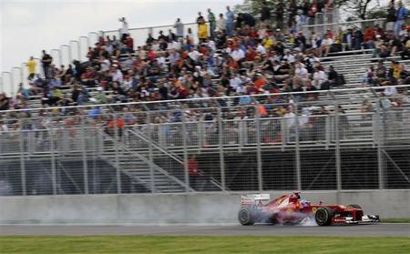 Sebastian Vettel se impone por un suspiro a Fernando Alonso en los últimos libres