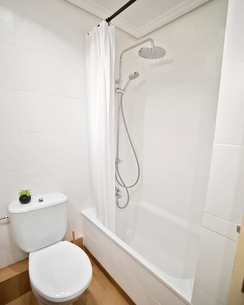 El Antes y después de un cuarto de baño (con lavadora), después de una