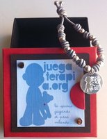 Pulsera solidaria Juegaterapia by Carittas