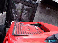 Sistemas antirrobo de Japón: atar con una cadena un Ferrari a una valla