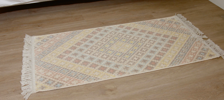 Alfombra pie de cama