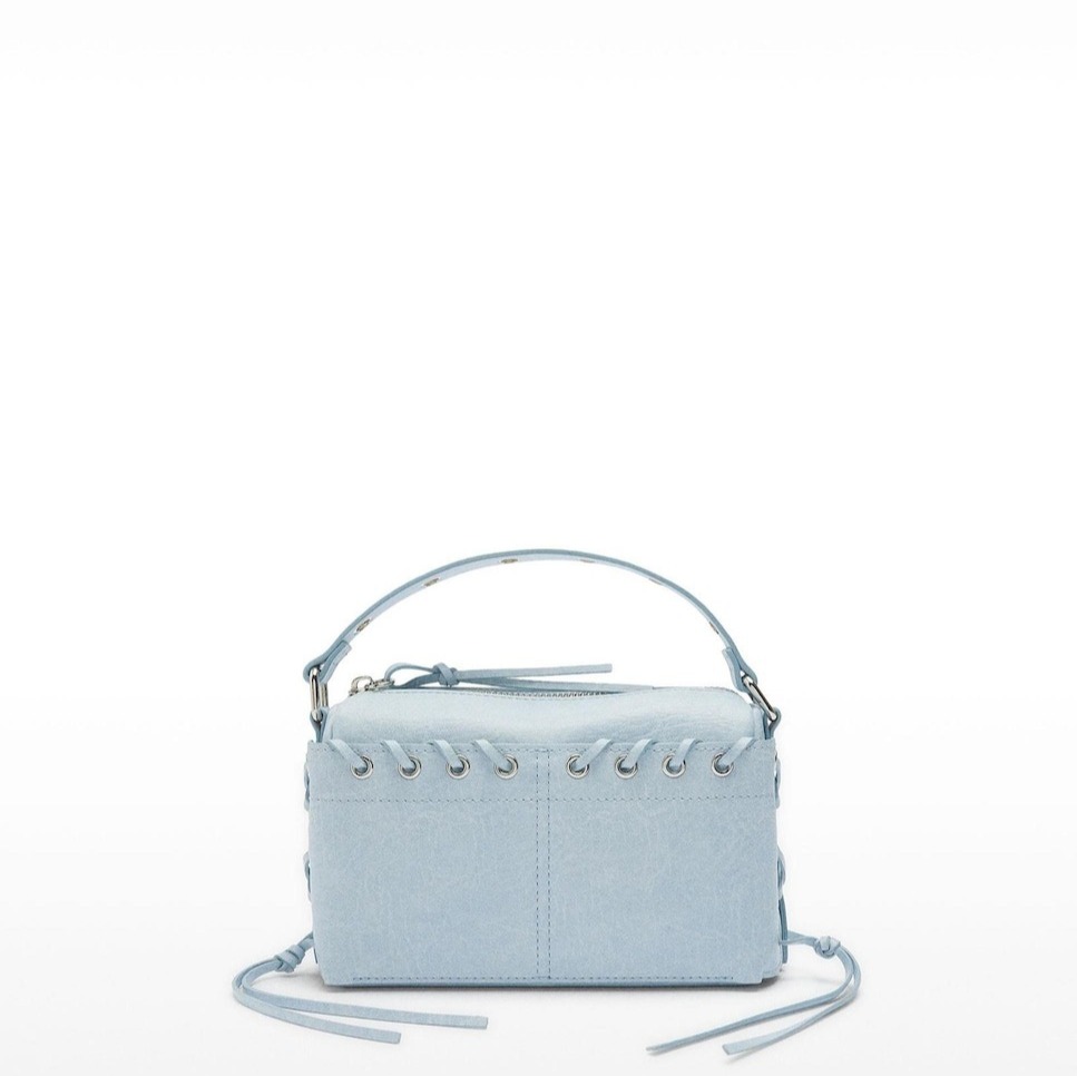 Parfois
Bolso de mano convertible a bandolera con bordes trenzados y cierre de cremallera en liso