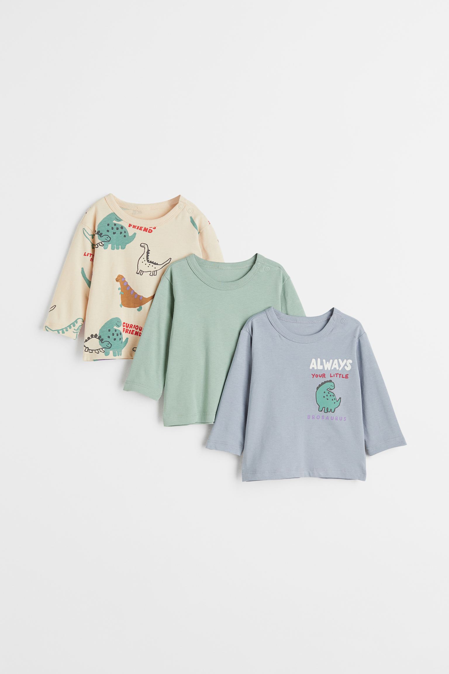 Camisetas de manga larga en punto de algodón suave con cuello redondo y botón de presión en un hombro.