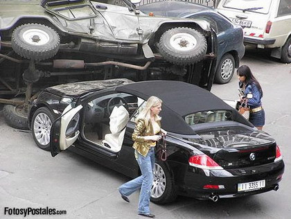 BMW Serie 6 Cabrio contra un todoterreno
