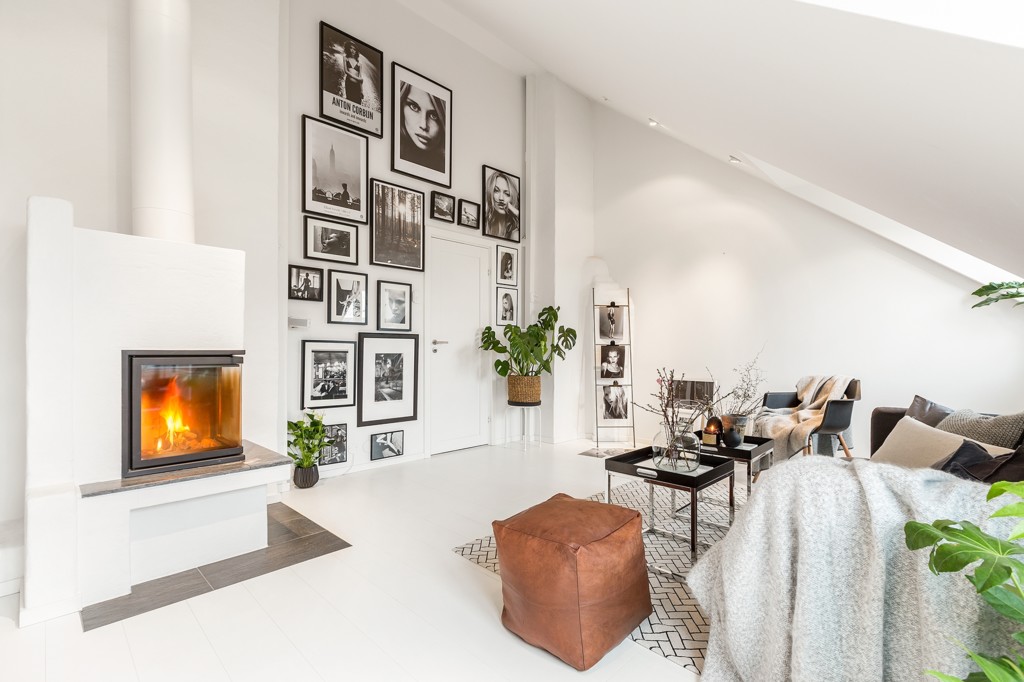 Un ático minimalista y con chimenea ¿Qué cambios harías en él?