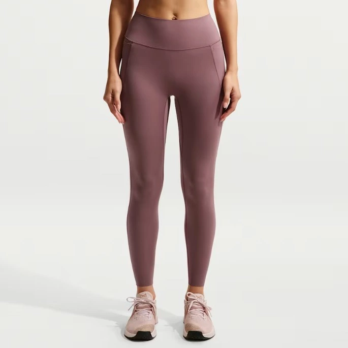 Nike Universa Leggings de talle alto sin costuras delanteras - Mujer