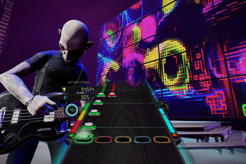 Stage Tour promotional image showing plastic guitars and drums with game branding