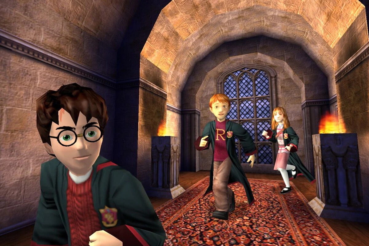 Three animated characters running down a stone corridor with arched ceilings and a large window with lattice design, lit by flaming torches.