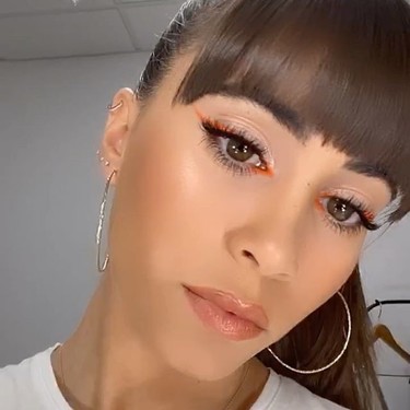 Aitana se apunta a la tendencia de maquillaje más alucinante del momento con un delineado de ojos naranja 
