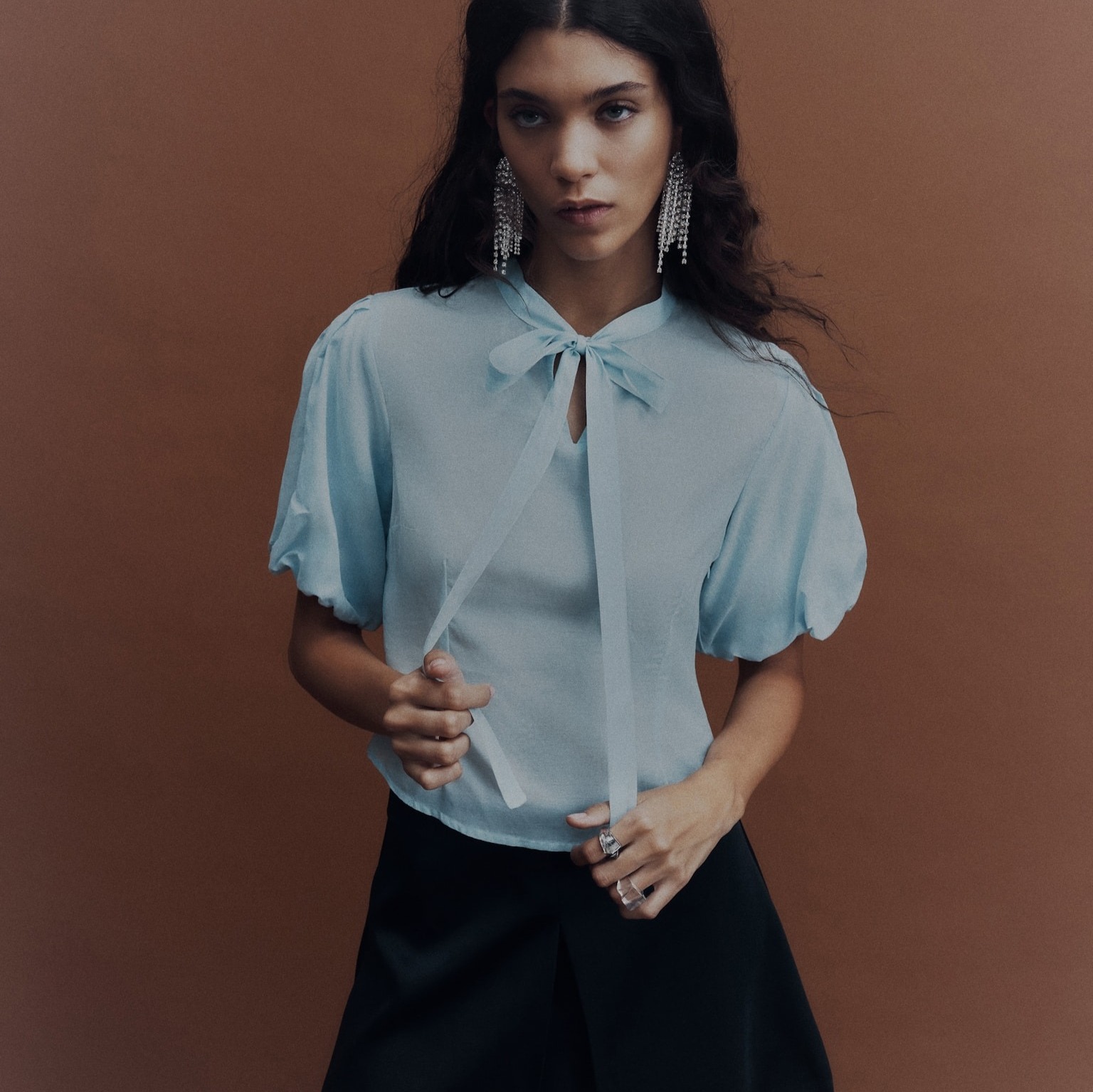 Blusa con mangas abullonadas

