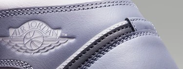 El outlet de Nike liquida las zapatillas AJ1 Mid de piel, ideales para llevar con todo en cualquier época del año 