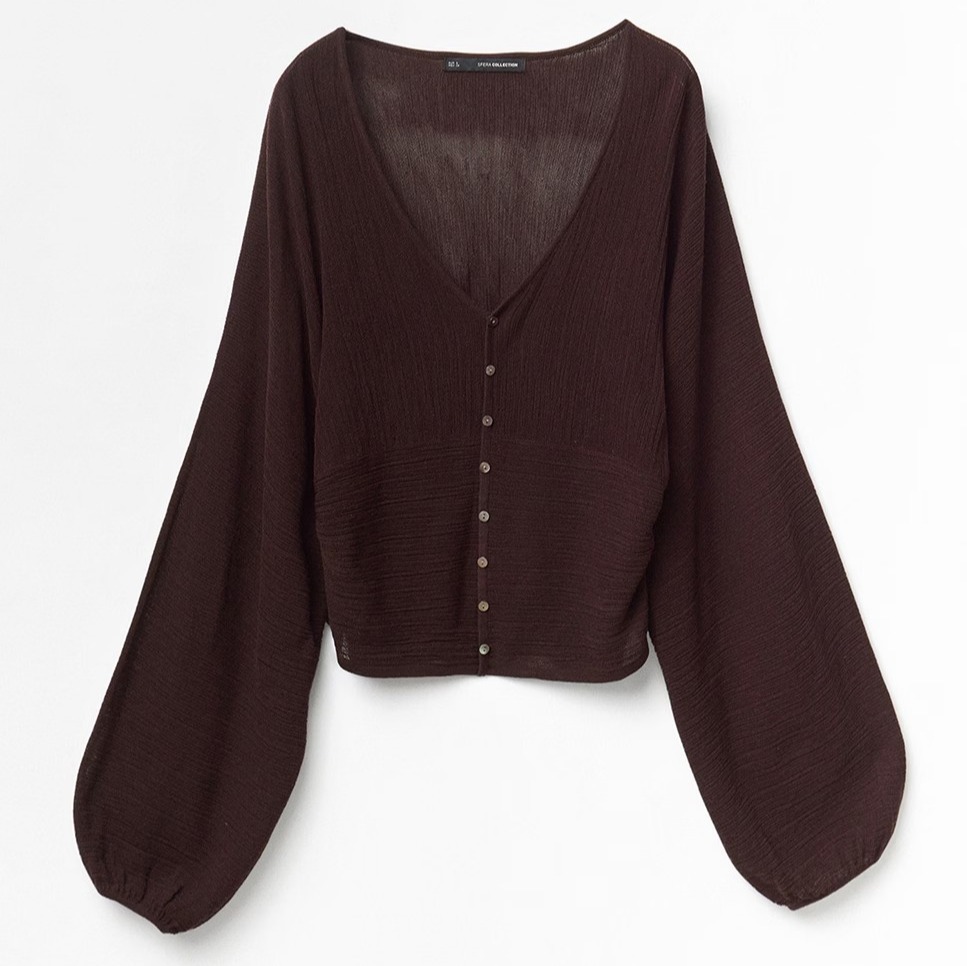 Blusa de mangas abullonadas