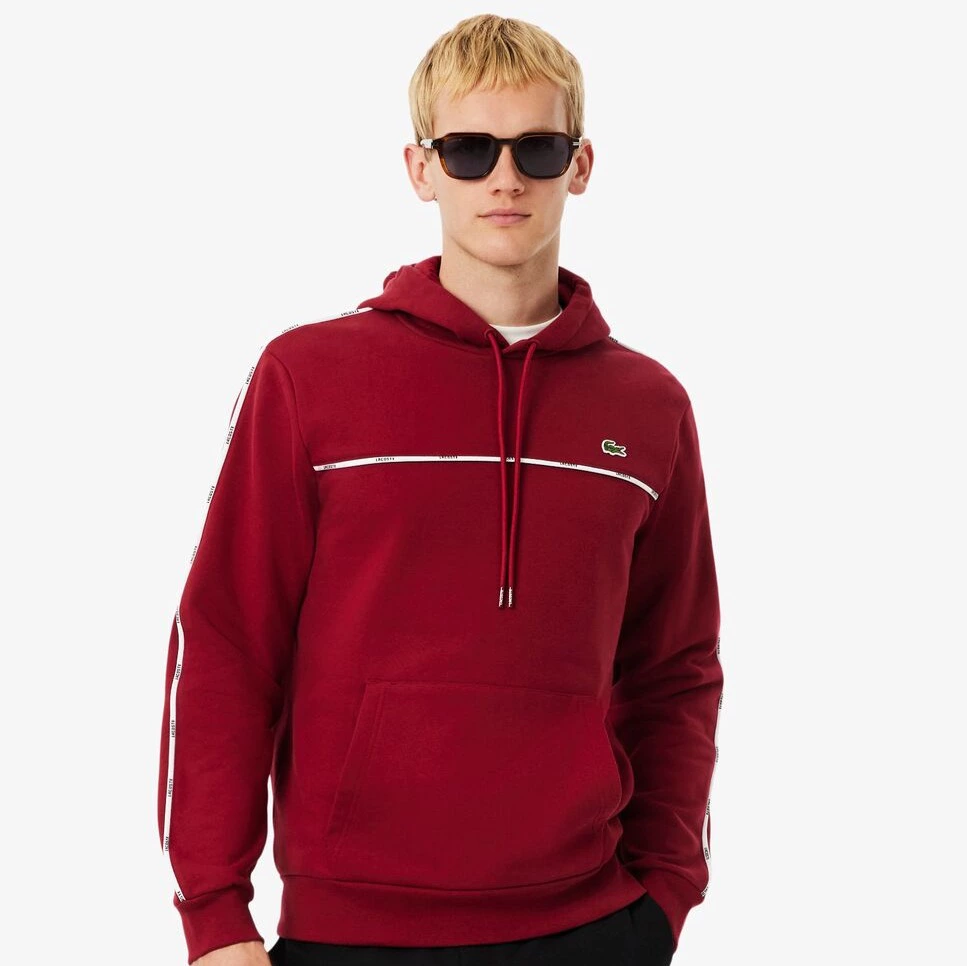 Lacoste - Sudadera de hombre de corte clásico de rayas con logotipo.