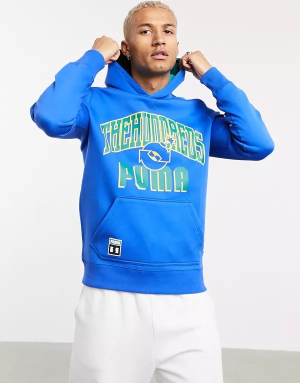 Sudadera azul y verde de diseño reversible con capucha y logo universitario en grande de Puma x The Hundreds