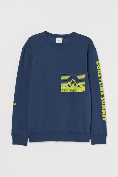 Sudadera de manga larga con cuello, puños y bajo en punto elástico de canalé. Tejido cepillado suave en el interior.