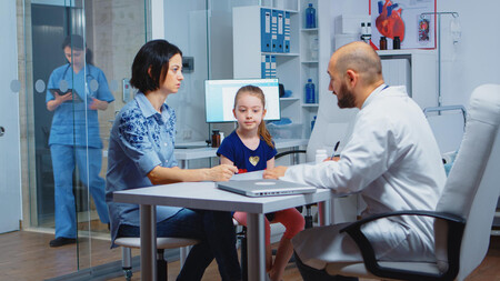 Pediatrician Writing Prescription For Kid After Examination Healthcare Practitioner Physician Specialist In Medicine Providing Health Care Services Consultation Diagnostic Treatment In Hospital