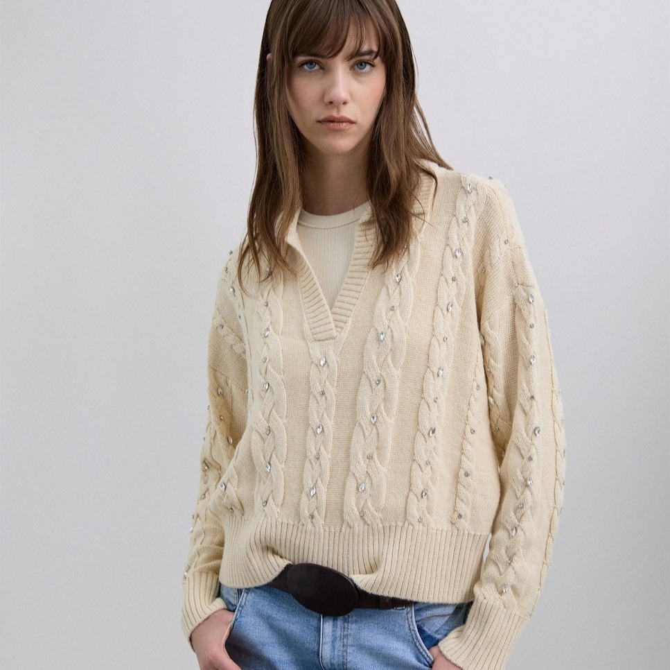 Scalpers - Jersey de mujer con cuello solapa y escote en pico.