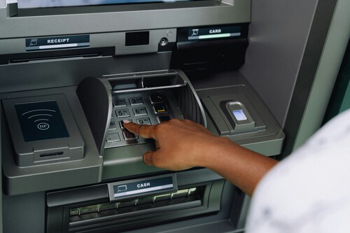 Person using an ATM
