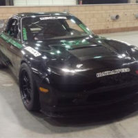 Mazda RX-7 widebody con 4 rotores y atacando en circuito. ¿Qué más necesitas para babear?