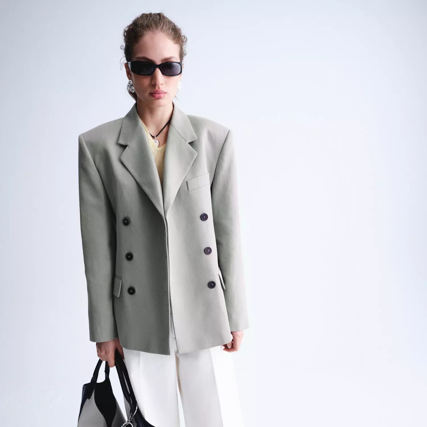 Blazer cruzada cierre botones
