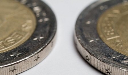 La plana mayor europea aprovecha el foro económico de Davos para reivindicar la importancia del Euro