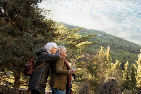 Two Senior Women Enjoying Hike Nature