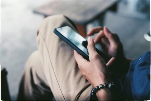 Free Photo Of A Person Using A Smartphone