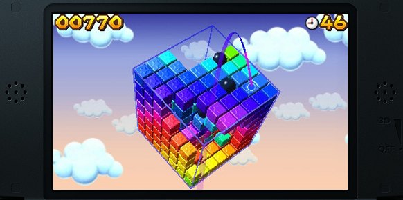 Tenemos unos cuantos minijuegos, como el de la imagen (Rompecubos) donde debemos lanzar a Mario mediante la interacción con la pantalla táctil.